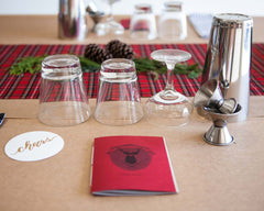 Whaling Club Holiday Cocktail Workshop Recipe Book on Table
